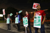 United Auto Workers members picket outside the General Motors Detroit-Hamtramck assembly plant in Hamtramck, Mich., Monday, Sept. 16, 2019. Roughly 49,000 workers at General Motors plants in the U.S. went on strike just before midnight Sunday, but talks between the UAW and the automaker will resume. (AP Photo/Paul Sancya)