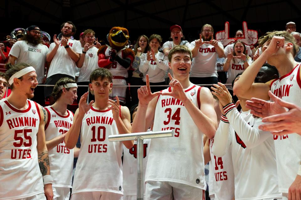 The Utah Utes players celebrate their win after the men’s college basketball game against the Colorado Buffaloes at the Jon M. Huntsman Center in Salt Lake City on Saturday, Feb. 3, 2024. | Megan Nielsen, Deseret News