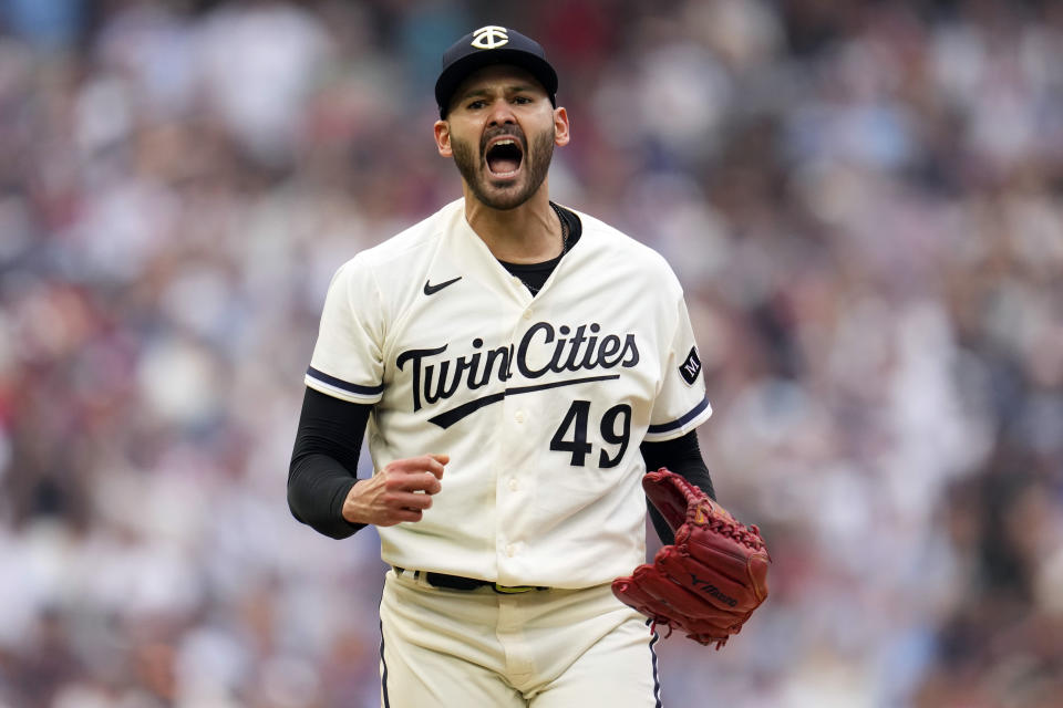 Minnesota Twins starting pitcher Pablo Lopez reacts after striking out Toronto Blue Jays' Brandon Belt during the fifth inning in Game 1 of an AL wild-card baseball playoff series Tuesday, Oct. 3, 2023, in Minneapolis. (AP Photo/Abbie Parr)