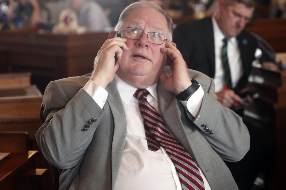 In this photo from Wednesday, March 15, 2023, Kansas House Speaker Dan Hawkins, R-Wichita, watches the chamber's electronic tally board during a vote in the Kansas Statehouse in Topeka, Kan. Hawkins and other GOP opponents of Democratic Gov. Laura Kelly's plan to expand Medicaid hold key leadership jobs that allow them to block a proposal. (AP Photo/John Hanna)(AP Photo/John Hanna)