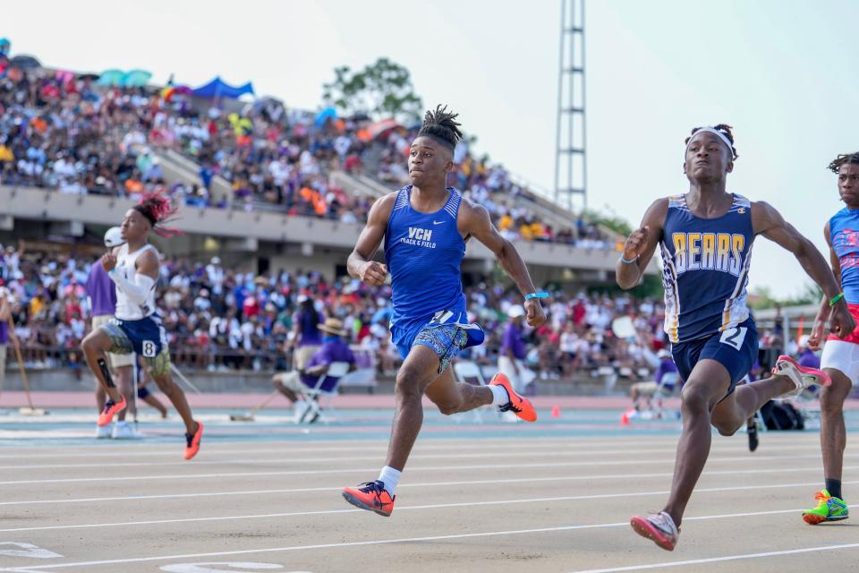 Vandebilt's Jaylon Coleman (middle) runs the 100 during the LHSAA state track meet in Baton Rouge on May 7.