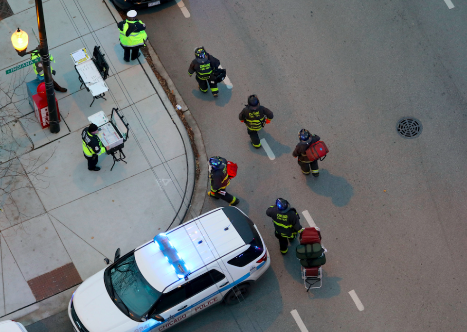 Emergency staff outside the Mercy Hospital in Chicago following the shooting (Picture: PA)