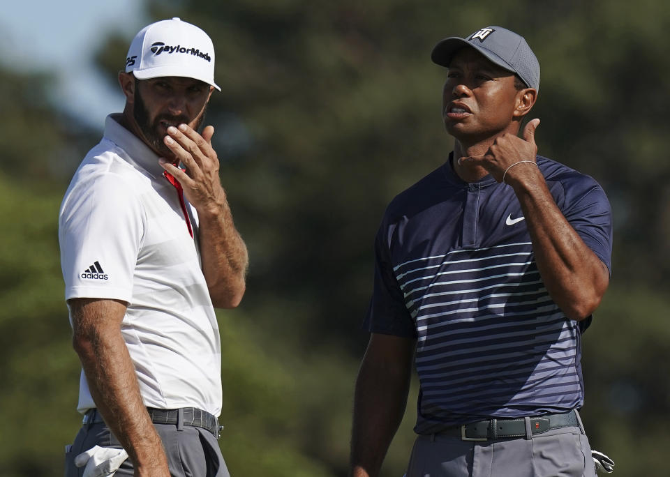 Dustin Johnson showed the way during Round 1 at the U.S. Open with a 1-under 69, while playing partner Tiger Woods is nine back after an 8-over 78. (AP)