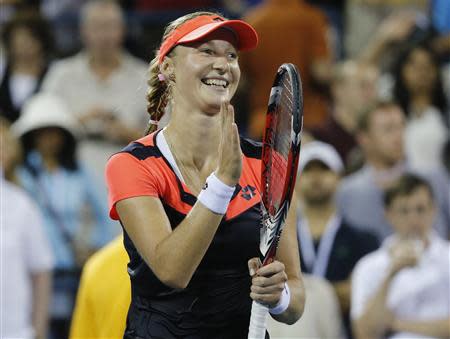 Ekaterina Makarova of Russia reacts after defeating Agnieszka Radwanska of Poland at the U.S. Open tennis championships in New York, September 1, 2013. REUTERS/Ray Stubblebine