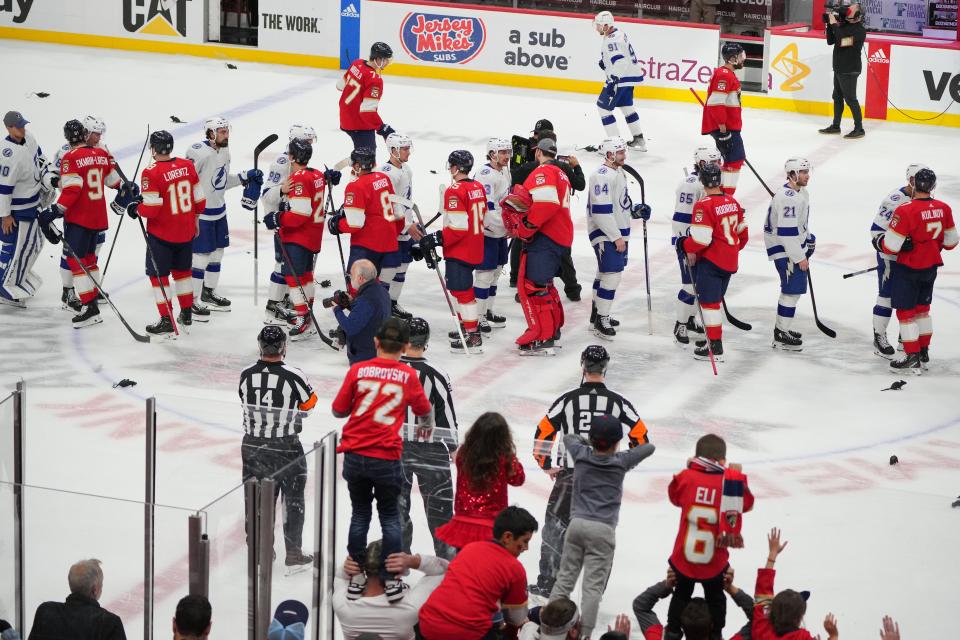 Apr 29, 2024; Sunrise, Florida, USA; Tampa Bay Lightning and Florida Panthers shake hands following game five of the first round of the 2024 Stanley Cup Playoffs at Amerant Bank Arena. The Panther won the series 4-1 and advance to the second round. Mandatory Credit: Jim Rassol-USA TODAY Sports