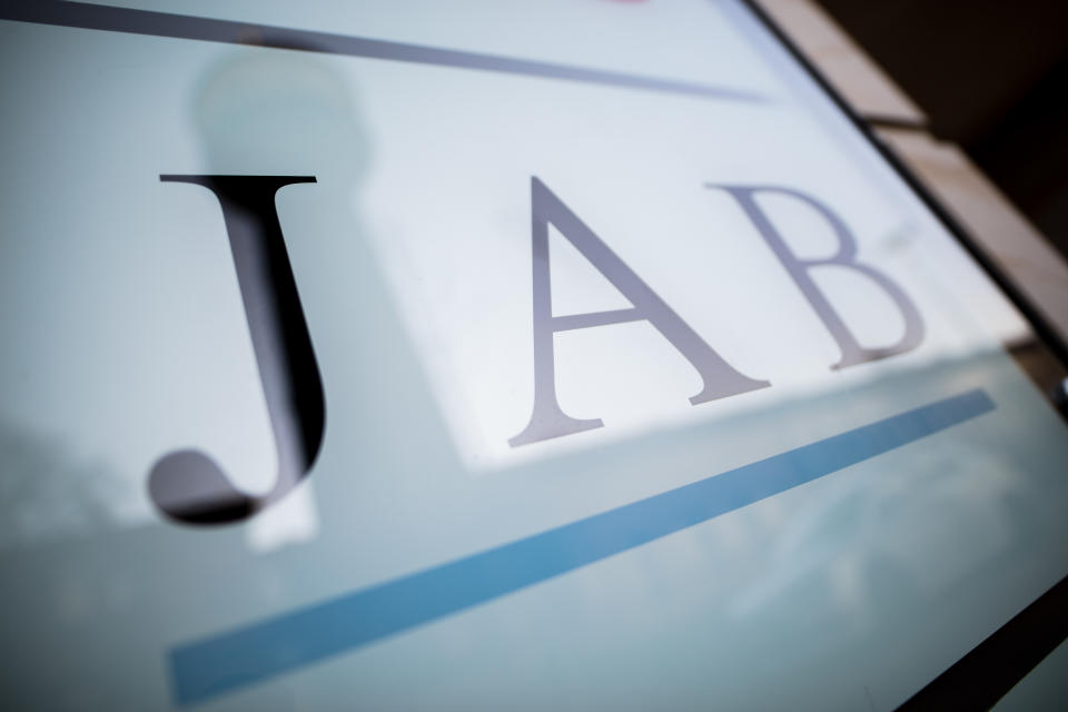 MANNHEIM, GERMANY - FEBRUARY 05: A 'JAB' logo sign is seen at the office building where 'JAB Service GmbH', a part of 'JAB Holding s.a r.l.', is located, on February 5, 2018 in Mannheim, Germany. Luxembourg-based JAB Holding is a financial holding owned by the German entrepreneurial family Reimann. JAB Holding has recently acquired Dr Pepper Snapple to combine it with its Keurig Green Mountain coffee business in one of the largest acquisitions of a soft drinks company. (Photo by Simon Hofmann/Getty Images)