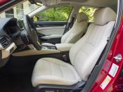<p>Leather-trimmed seats in the EX-L Hybrid.</p>