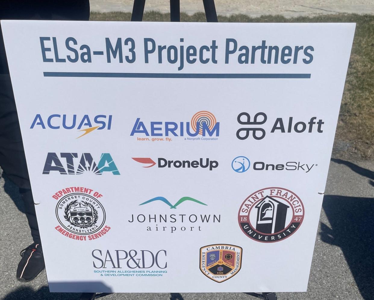 A sign lists the organizations involved in the Emergency Life Saving through Multi-Modal Mobility, or ELSa-M3, project.