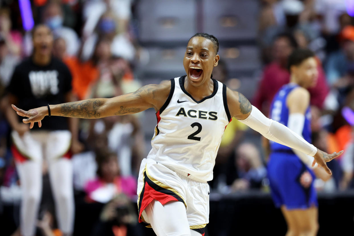 The Las Vegas Aces' Riquna Williams celebrates during the fourth quarter against the Connecticut Sun in Game 4 of the 2022 WNBA Finals at Mohegan Sun Arena in Uncasville, Connecticut, on Sept. 18, 2022. The Aces won, 78-71, to earn their first WNBA championship in franchise history. (Maddie Meyer/Getty Images)