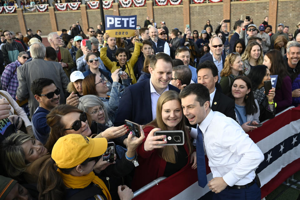 Democratic presidential candidate former South Bend, Ind., Mayor Pete Buttigieg greets the audience during a campaign stop in Arlington, Va., Sunday, Feb. 23, 2020. (AP Photo/Susan Walsh)