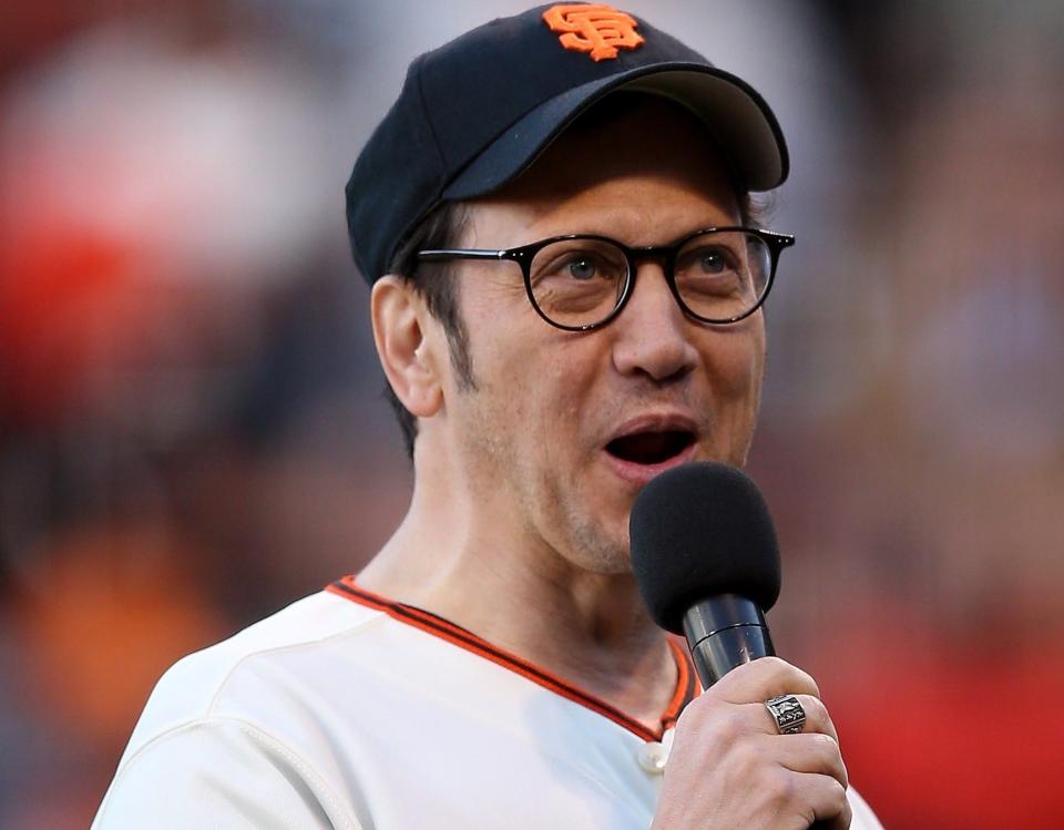 Actor Rob Schneider announces "Let's Play Ball" before the San Francisco Giants game in 2012 in San Francisco. He's a 49ers fan, too.