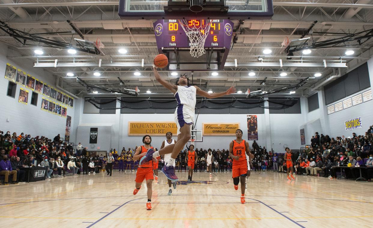 Camden's DJ Wagner soars to the basket for a dunk during the 4th quarter of the boys basketball game between Camden and Woodrow Wilson played at Camden High School on Tuesday, January 25, 2022.  