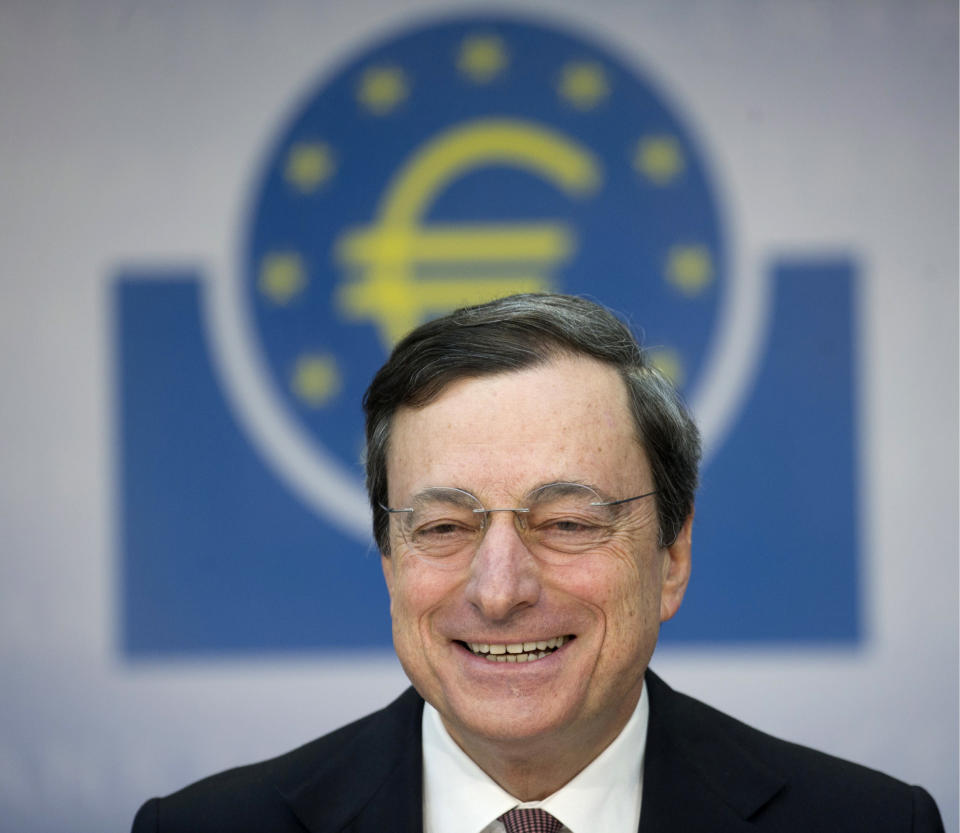 European Central Bank, ECB, chief Mario Draghi, smiles during a press conference at the ECB's headquarters in Frankfurt, central Germany, Wednesday April 4, 2012. European Central Bank head Mario Draghi says a weak eurozone economy has held back businesses from applying for loans despite the abundant cash made available by the central bank's massive amounts of cheap credit to lenders. Draghi made his remarks Wednesday after the bank left its key interest rate unchanged at 1 percent - as expected. (AP Photo/dapd/ Thomas Lohnes)