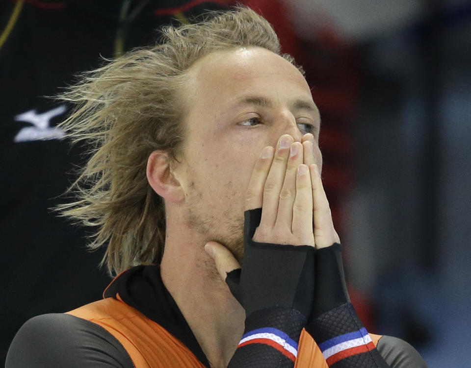 Gold medallist Michel Mulder from the Netherlands celebrates after his second heat race in the men's 500-meter speedskating race at the Adler Arena Skating Center during the 2014 Winter Olympics, Monday, Feb. 10, 2014, in Sochi, Russia. (AP Photo/Patrick Semansky)