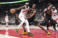 Toronto Raptors' Pascal Siakam (43) shields the ball from Cleveland Cavaliers' Evan Mobley during the first half of an NBA basketball game in Toronto, Monday, Nov. 28, 2022. (Chris Young/The Canadian Press via AP)