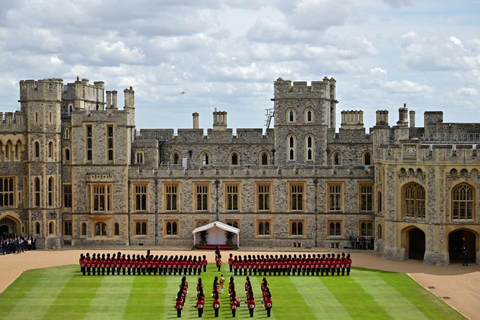 Members of the Welsh Guards prepare ahead of a guard of honour to be inspected by US President Joe Biden and King Charles III (PA)