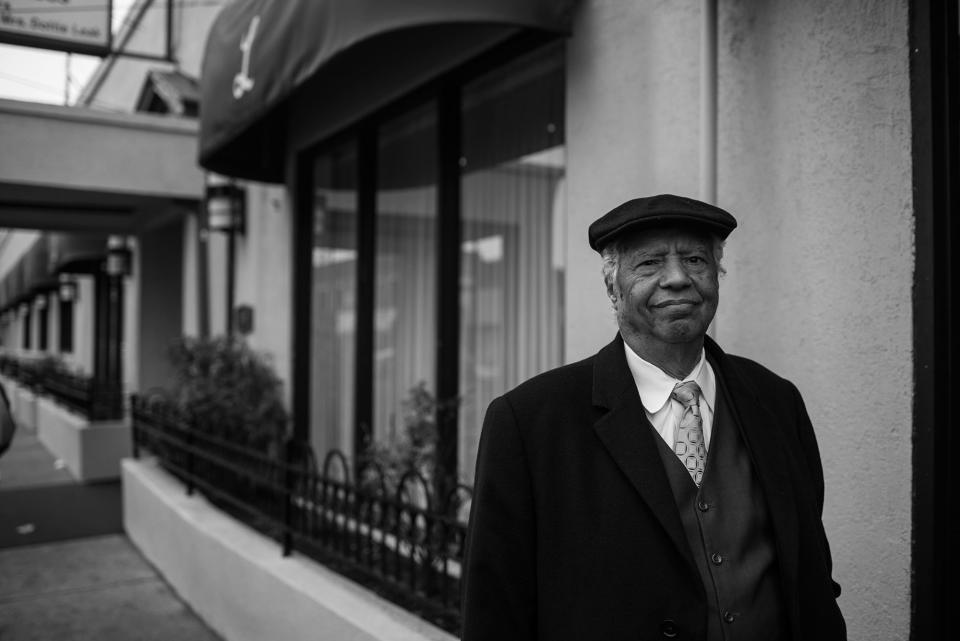 <p>Spencer Leak Sr stands in front of Leak and Sons, one of the oldest funeral homes on Chicago’s south side and one that is burying many victims of Chicago’s gun violence. (Photo: Jon Lowenstein for Yahoo News) </p>