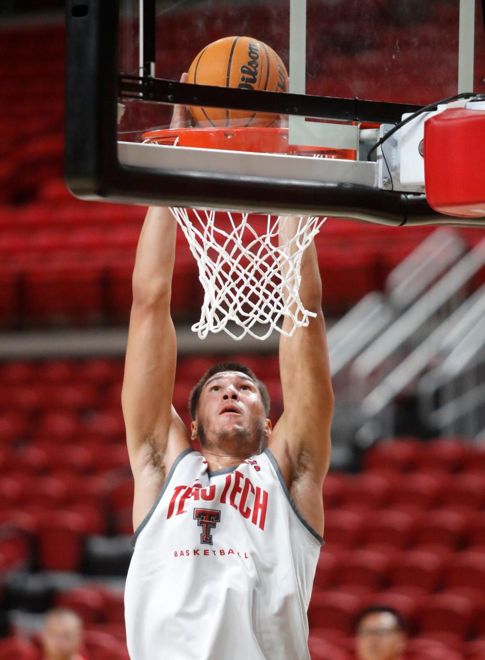 Forward Daniel Batcho (12) dunks during Texas Tech’s first official practice, Sept. 26, 2022, at the United Supermarkets Arena in Lubbock.