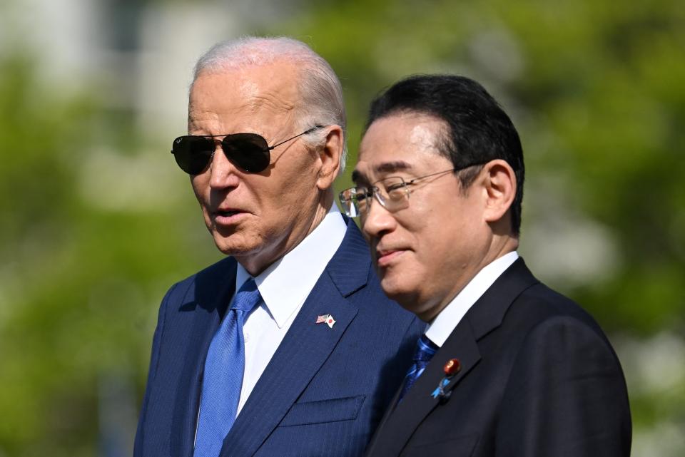 President Joe Biden and Japanese Prime Minister Fumio Kishida take part in an Official Arrival Ceremony on the White House South Lawn