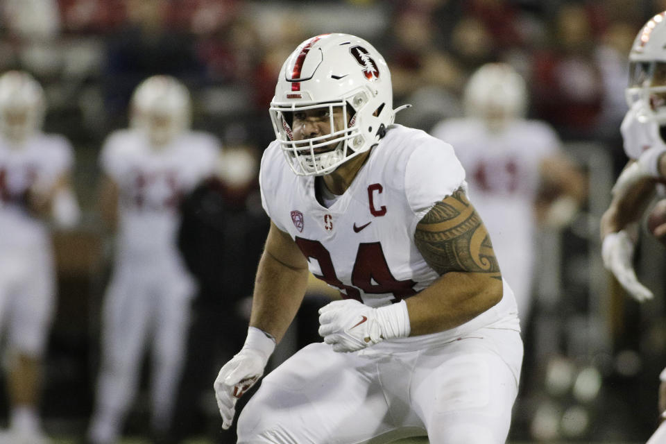 Stanford fullback Houston Heimuli prepares to block during the second half of an NCAA college football game against Washington State, Oct. 16, 2021, in Pullman, Wash. Stanford has embraced bringing in players such as Heimuli after their two-year Mormon missions, valuing their life experience. (AP Photo/Young Kwak)