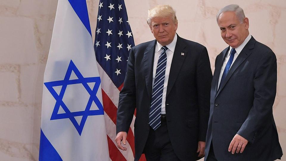 President Donald Trump, left, arrives with Israeli Prime Minister Benjamin Netanyahu at the Israel Museum to speak in Jerusalem, May 23, 2017.