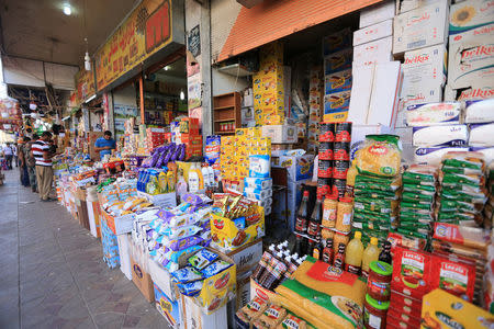 Residents shop from a market in the town of Zakho, Iraq October 11, 2017. REUTERS/Ari Jalal