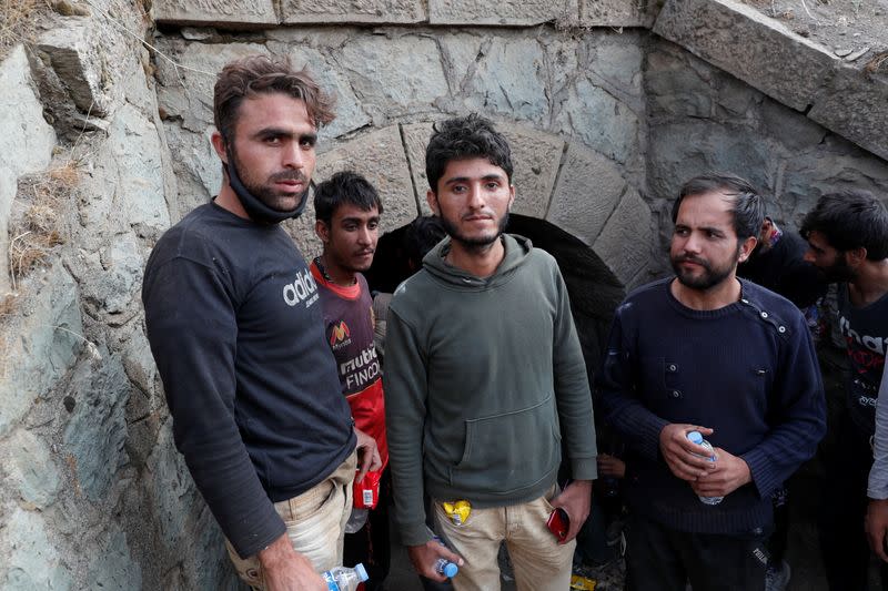 Migrants from Afghanistan hide from security forces after crossing illegally into Turkey from Iran, near Tatvan