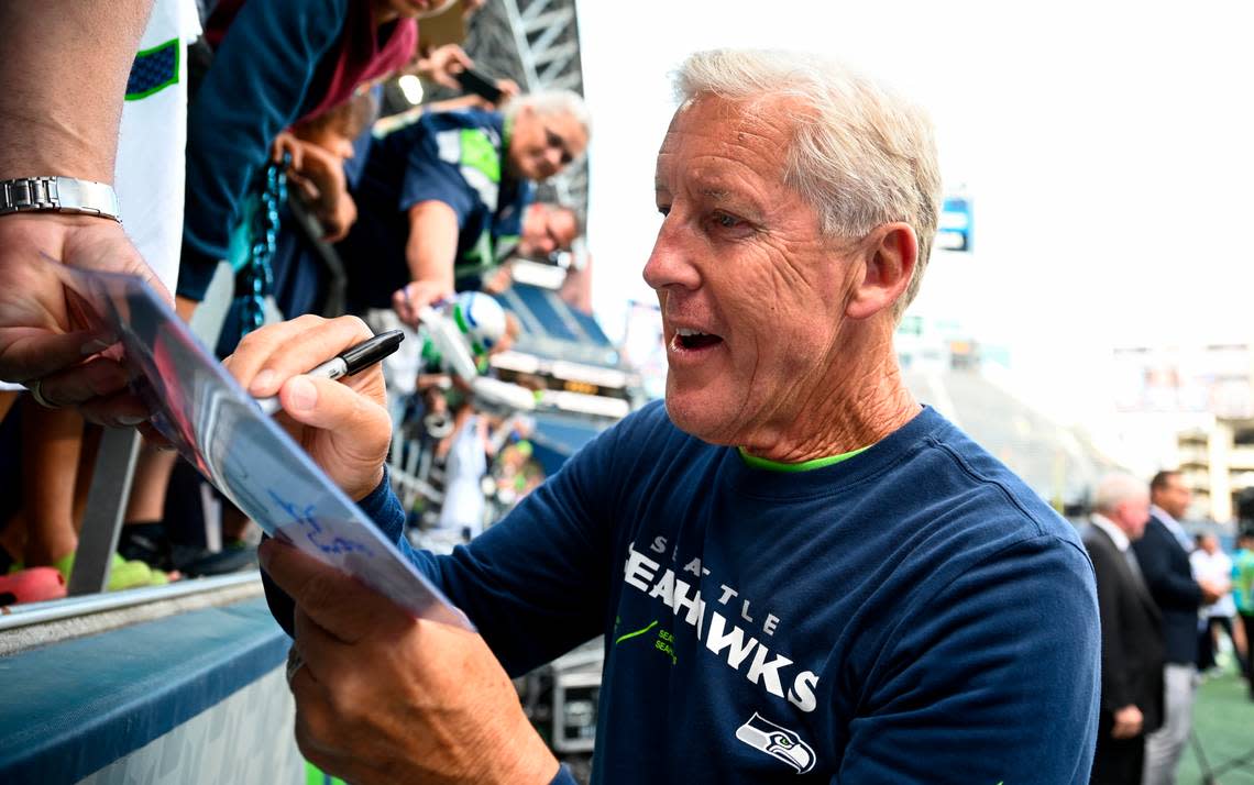 Seattle Seahawks head coach Pete Carroll signs autographs before of the preseason game against the Minnesota Vikings at Lumen Field, Thursday, Aug. 10, 2023, in Seattle, Wash. Brian Hayes/bhayes@thenewstribune.com