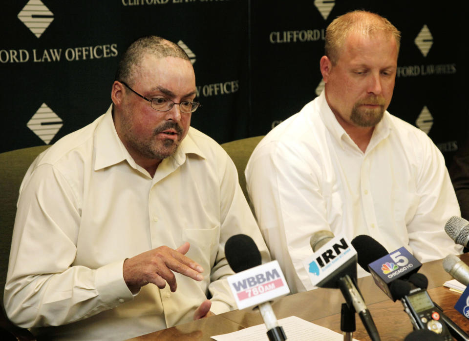 John Jentz, left, of St. Peter, Minn., and Robert Schmidt, of Hutchinson, Minn., who were both severely burned in April 2010 at a grain elevator explosion in downstate Illinois, speak about their settlement at a news conference at Clifford Law Offices Monday, June 4, 2012, in Chicago. Jentz described his losses after a federal jury awarded him $75 million in a lawsuit against ConAgra Foods Inc. and a subcontractor. Jentz, Schmidt and a third victim from Iowa were awarded a total $181 million in damages. (AP Photo/M. Spencer Green)