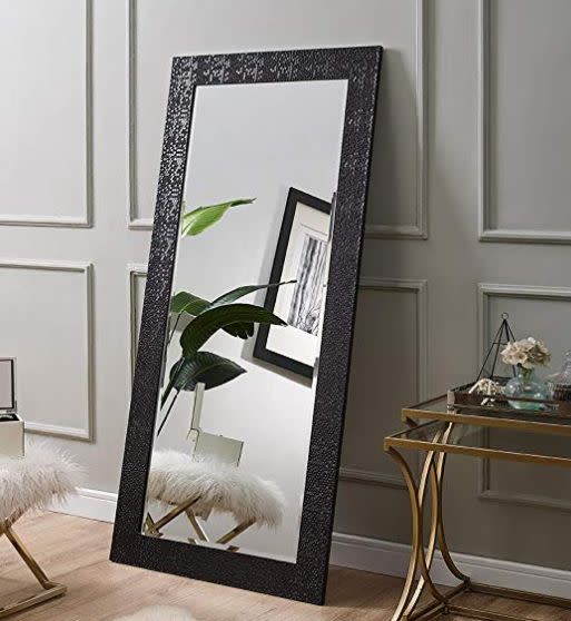 <strong><a href="https://www.amazon.com/Naomi-Home-Mosaic-Style-Mirror/dp/B07C8FRLX5?thehuffingtop-20" target="_blank" rel="noopener noreferrer">Find it for $120 on Amazon.</a></strong>