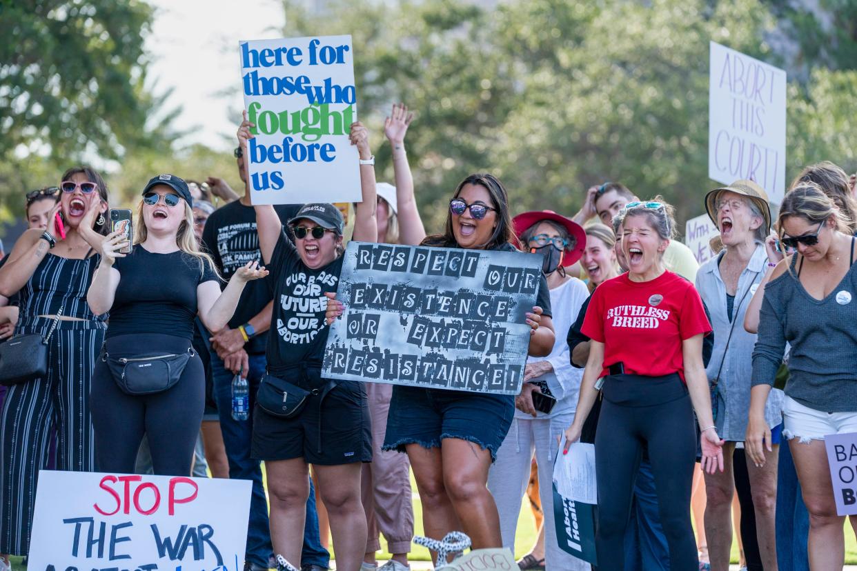 People yell to let out their emotions during a rally protesting the Supreme Court decision to overturn Roe v. Wade in West Palm Beach, Florida on June 24, 2022.