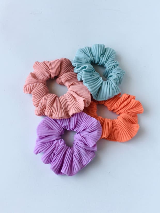 <p>Eternally in Amber Bold Crinkle Scrunchie, $10, <a href="https://www.eternallyinambershop.com/product/bold-crinkle-scrunchies-jlbx/289?cs=true" rel="nofollow noopener" target="_blank" data-ylk="slk:available here;elm:context_link;itc:0;sec:content-canvas" class="link ">available here</a>.</p>