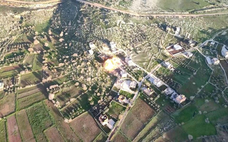 An aerial shot released by the IDF on Thursday shows an explosion at an unidentified location in Lebanon.