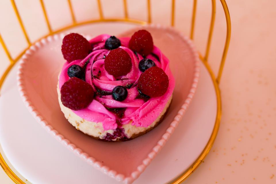 A rose cheesecake is served on Thursday, Feb. 15, 2024, at Cafe Rose, which opened at 307 E. Franklin in Downtown El Paso. The cafe focuses on everything pink.