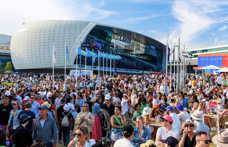 Crowds at Grand Slam Oval with signage during the 2023 Australian Open at Melbourne Park in Melbourne on Saturday, January 21, 2023.