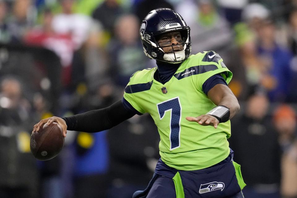 Seattle Seahawks quarterback Geno Smith (7) passes against the San Francisco 49ers during the first half of an NFL football game in Seattle, Thursday, Dec. 15, 2022. (AP Photo/Marcio Jose Sanchez)