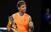 Rafael Nadal showed flashes of his best form as he eased past home favourite Matthew Ebden to reach the Australian Open third round. 