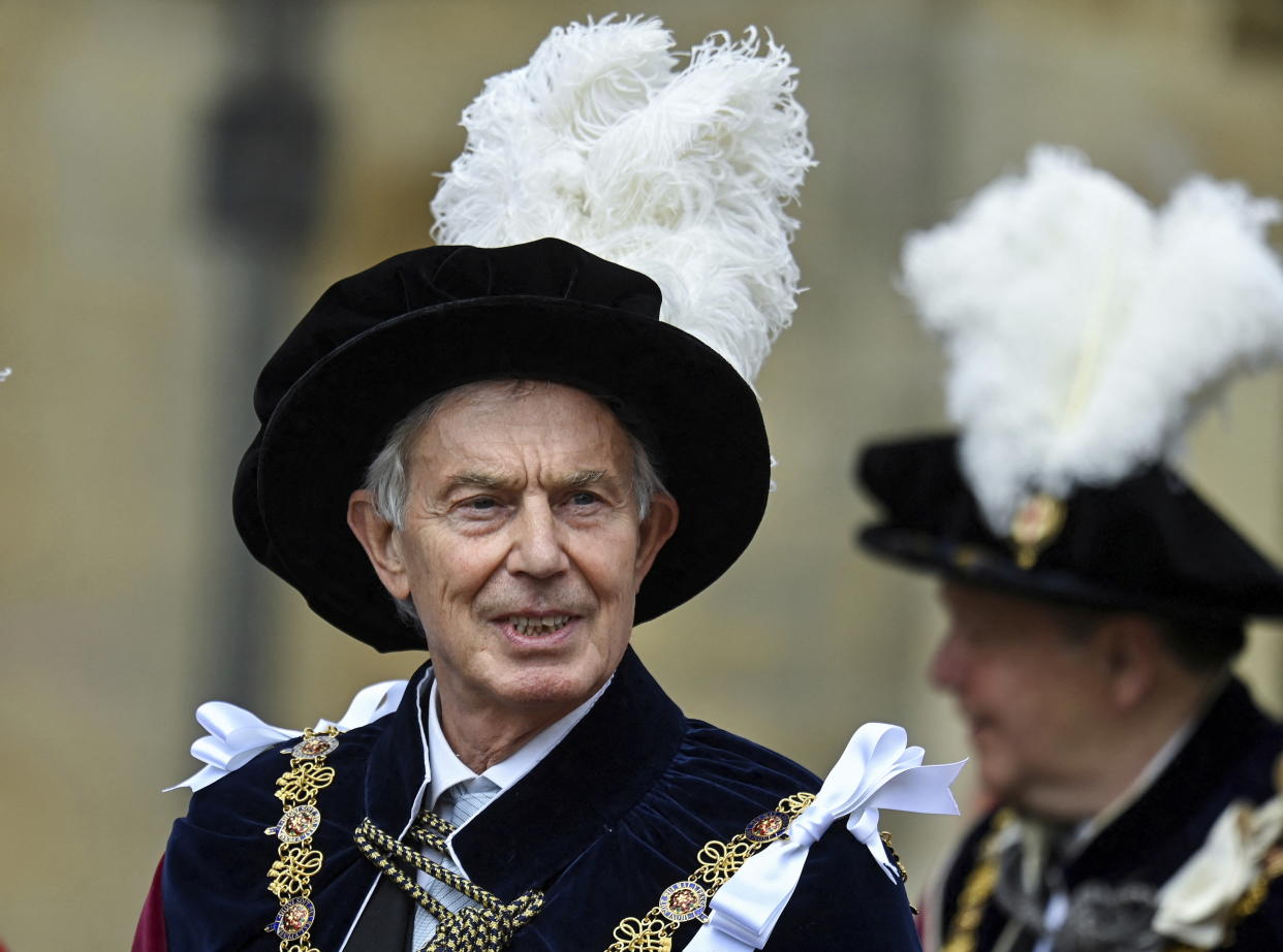 Former British Prime Minister Tony Blair attends the Order of the Garter service at Windsor Castle, in Windsor, England, Monday, June 13, 2022. The Order of the Garter is the oldest and most senior Order of Chivalry in Britain, established by King Edward III nearly 700 years ago. This year Prince Charles' wife Camilla, the Duchess of Cornwall, former British Prime Minister Tony Blair and former leader of the British House of Lords Baroness Amos were all installed in the Order. (Toby Melville/Pool via AP)