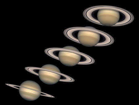 FILE PHOTO: These Hubble Space Telescope images of Saturn, shown in this handout composite photo released June 8, 2001 and captured from 1996 to 2000, depict the planet in different stages of its 29-year journey around the sun. NASA/The Hubble Heritage Team/ Handout via REUTERS/File Photo