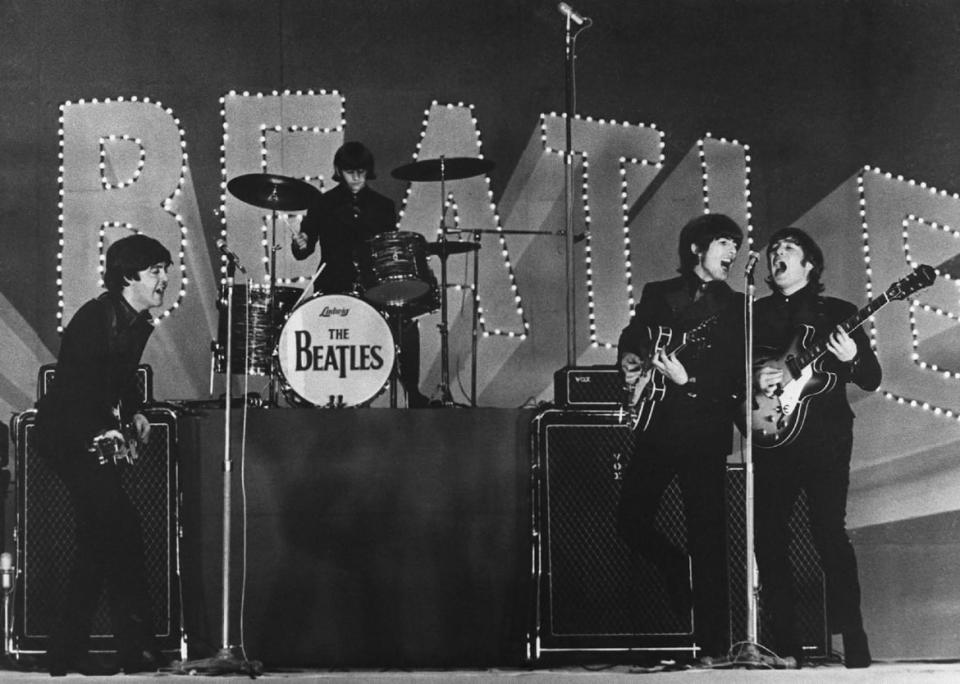 <div class="inline-image__caption"><p>The Beatles performing during their concert at the Budokan in Tokyo, Japan, on June 30, 1966. </p></div> <div class="inline-image__credit">Jiji Press/AFP/Getty</div>