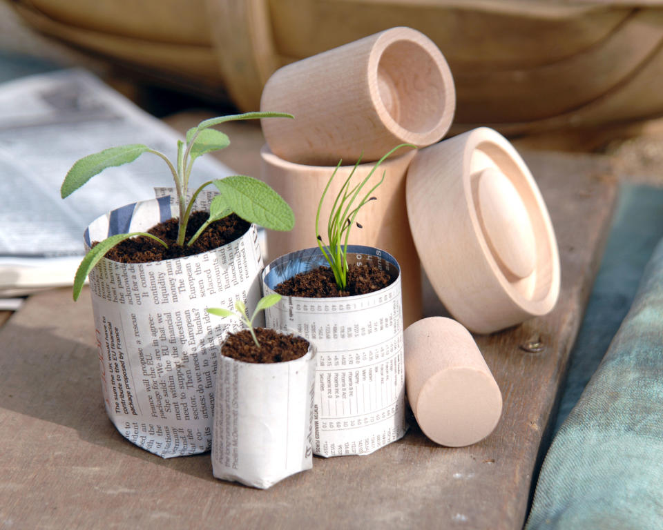 9. Make budget-friendly seedling pots from newspaper
