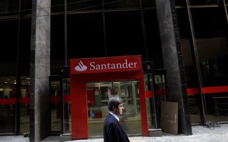 A man walks past a Banco Santander branch in downtown Rio de Janeiro, Brazil January 29, 2018. Picture taken January 29. REUTERS/Ricardo Moraes