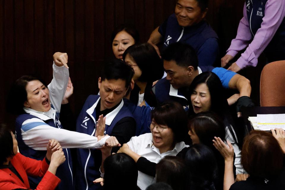 Lawmakers shoving each other