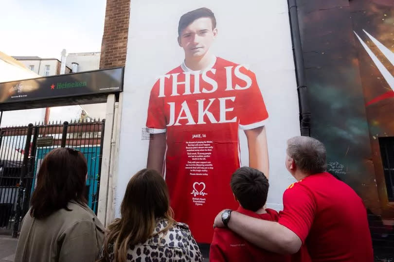 Mural of Jake wearing a red football top