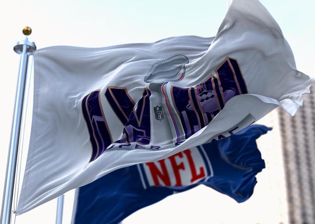 Super Bowl and NFL flags flying in the wind