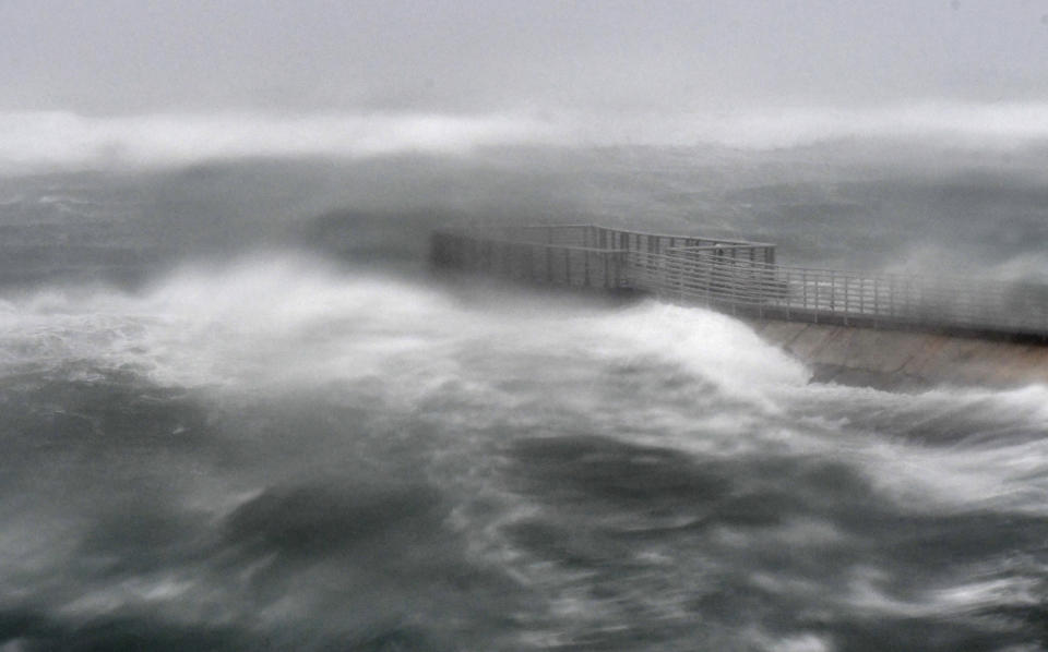 <p><strong>Boynton Beach</strong><br>A rough surf surrounds Boynton Beach inlet in Boynton Beach, Fla. (Photo: Jim Rassol/South Florida Sun-Sentinel via AP) </p>