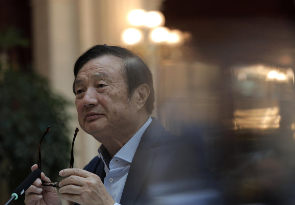 Ren Zhengfei, founder and CEO of Huawei, takes off his glasses during a round table meeting with the media in Shenzhen city, south China's Guangdong province, Tuesday, Jan. 15, 2019. The founder of network gear and smart phone supplier Huawei Technologies said the tech giant would reject requests from the Chinese government to disclose confidential information about its customers. (AP Photo/Vincent Yu)