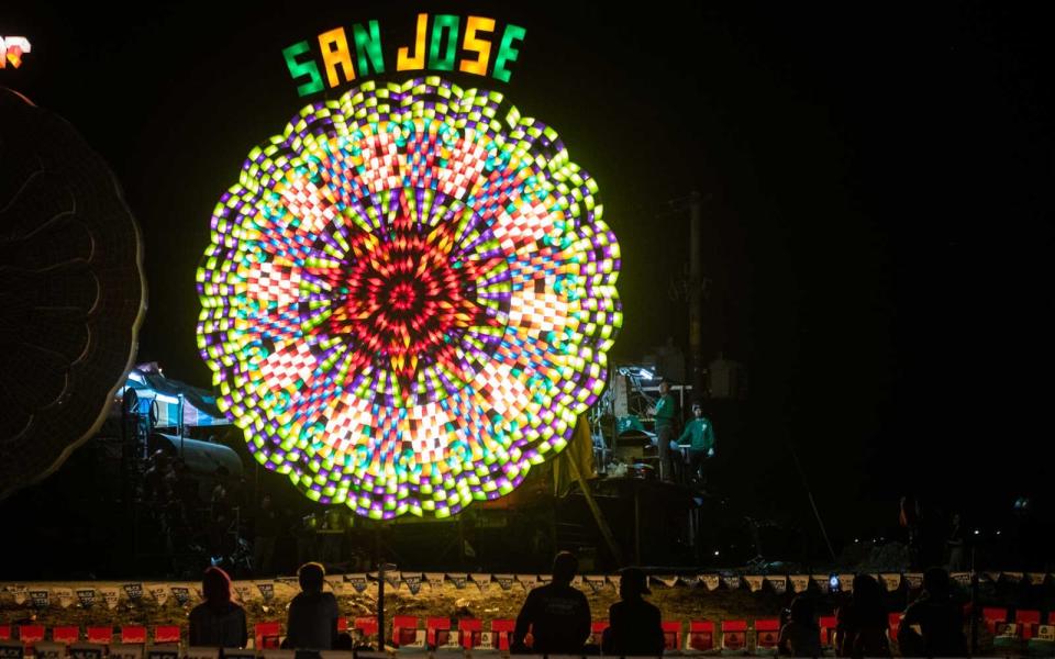 <p>The lanterns are around 20 feet tall, towering over the crowds below.</p>