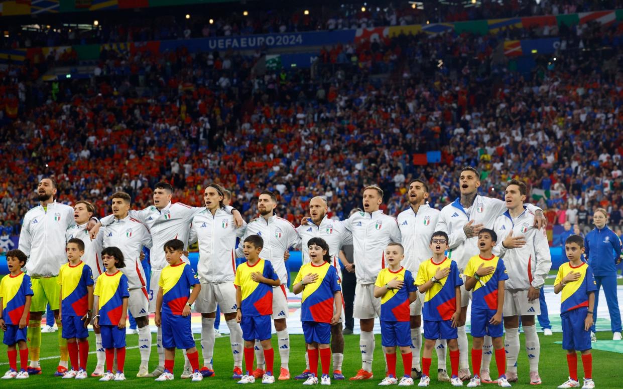 Italy line up for the anthems.