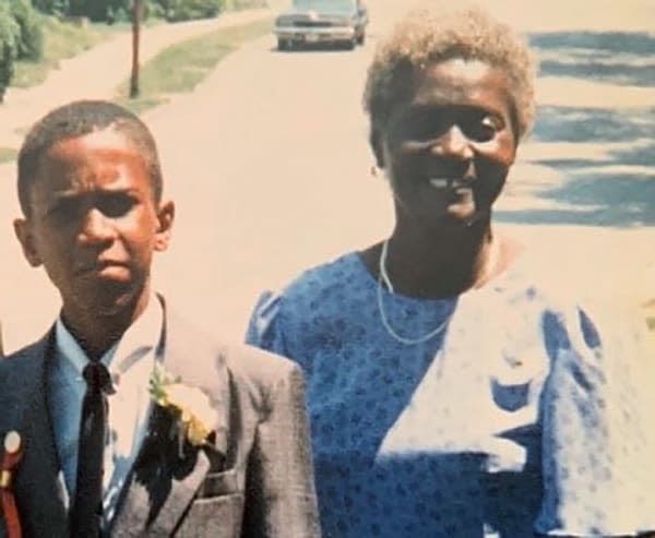 Walter Bernie Jackson Jr., with his grandmother Susie J. Jackson, one of the Emanuel Nine victims, at his eighth grade graduation ceremony. (Courtesy Walter Bernie Jackson, Jr.)